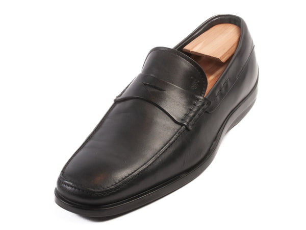 Tod’s Black Penny Loafers