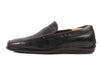 Tod’s Black Penny Loafers