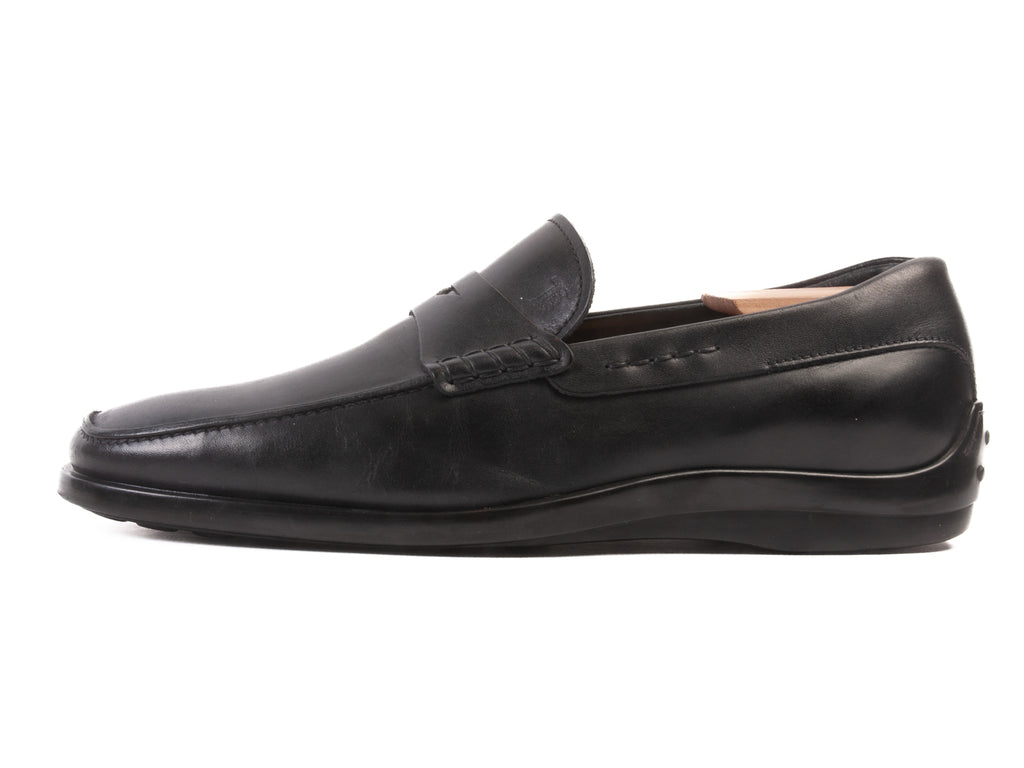 Tod’s Black Penny Loafers