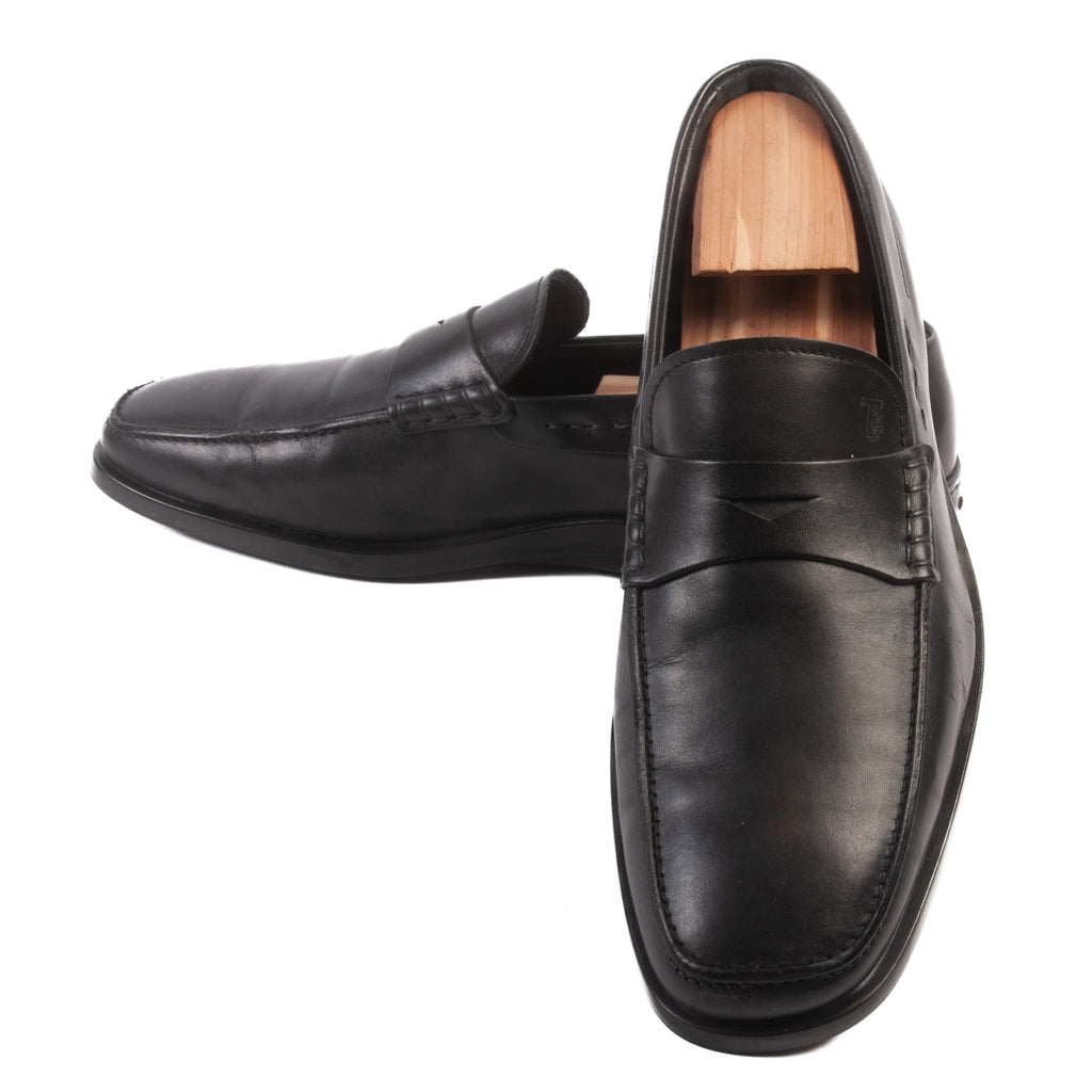 Tod’s Black Penny Loafers