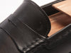 Tod’s Black Penny Loafers