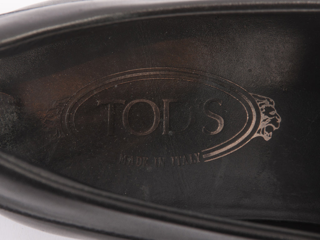 Tod’s Black Penny Loafers